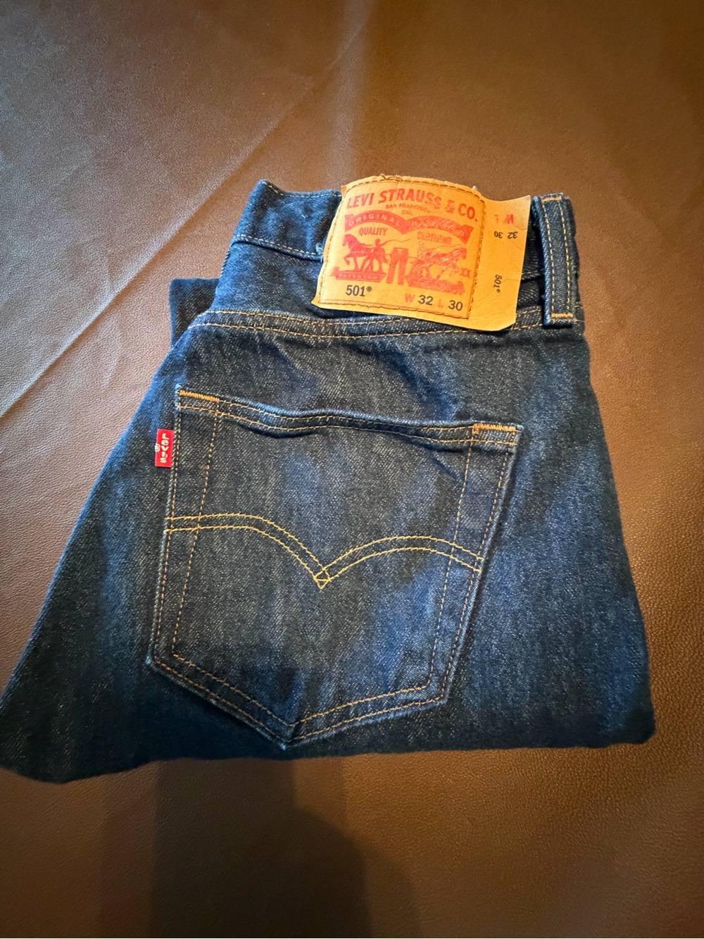 Levi's Men's 501 Straight leg button fly Jeans 
NOTE: Length shrunk to 27”